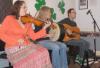 Athas performing in the Parlor of the ICHC during the Shamrock Club's Post St. Pat's Parade Party